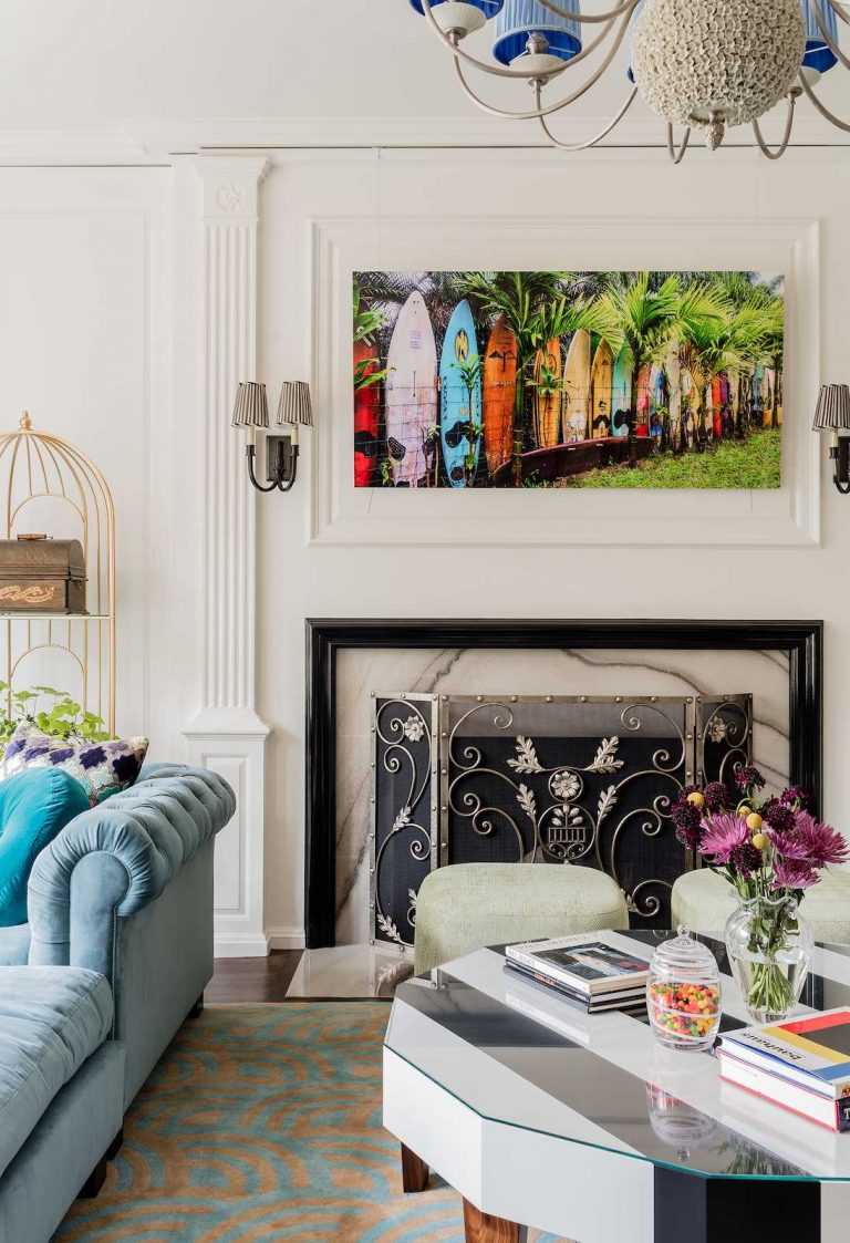 Above the fireplace hangs a photograph of surfboards